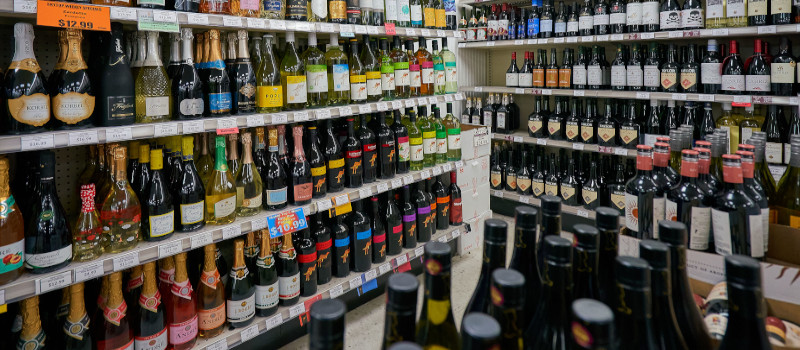 corner store wine bottles wall